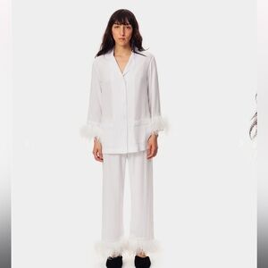 SLEEPER white pajama set with feather trim. Only worn once.